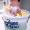 TotalBoat Boat Soap being used with a sponge
